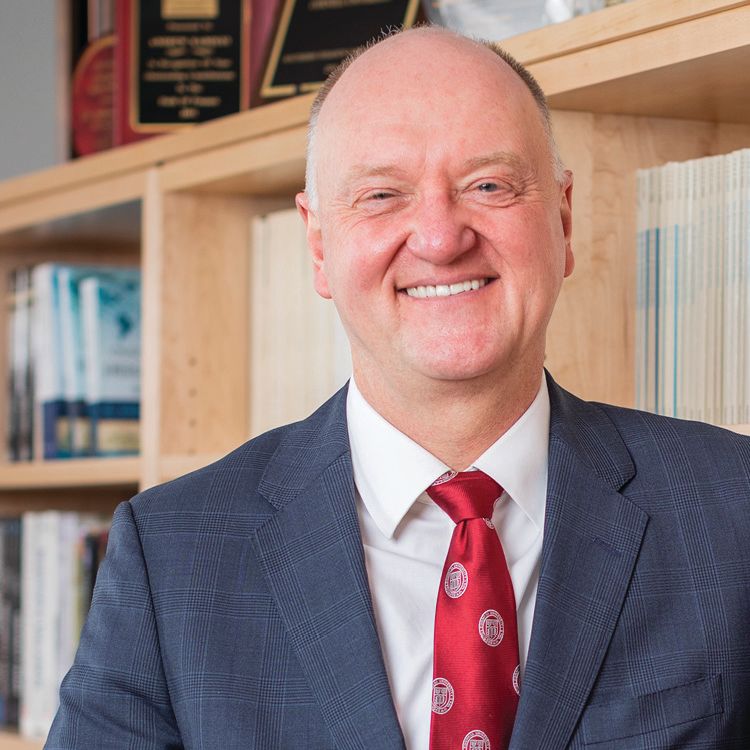 Headshot of Dean Andrew Karolyi.