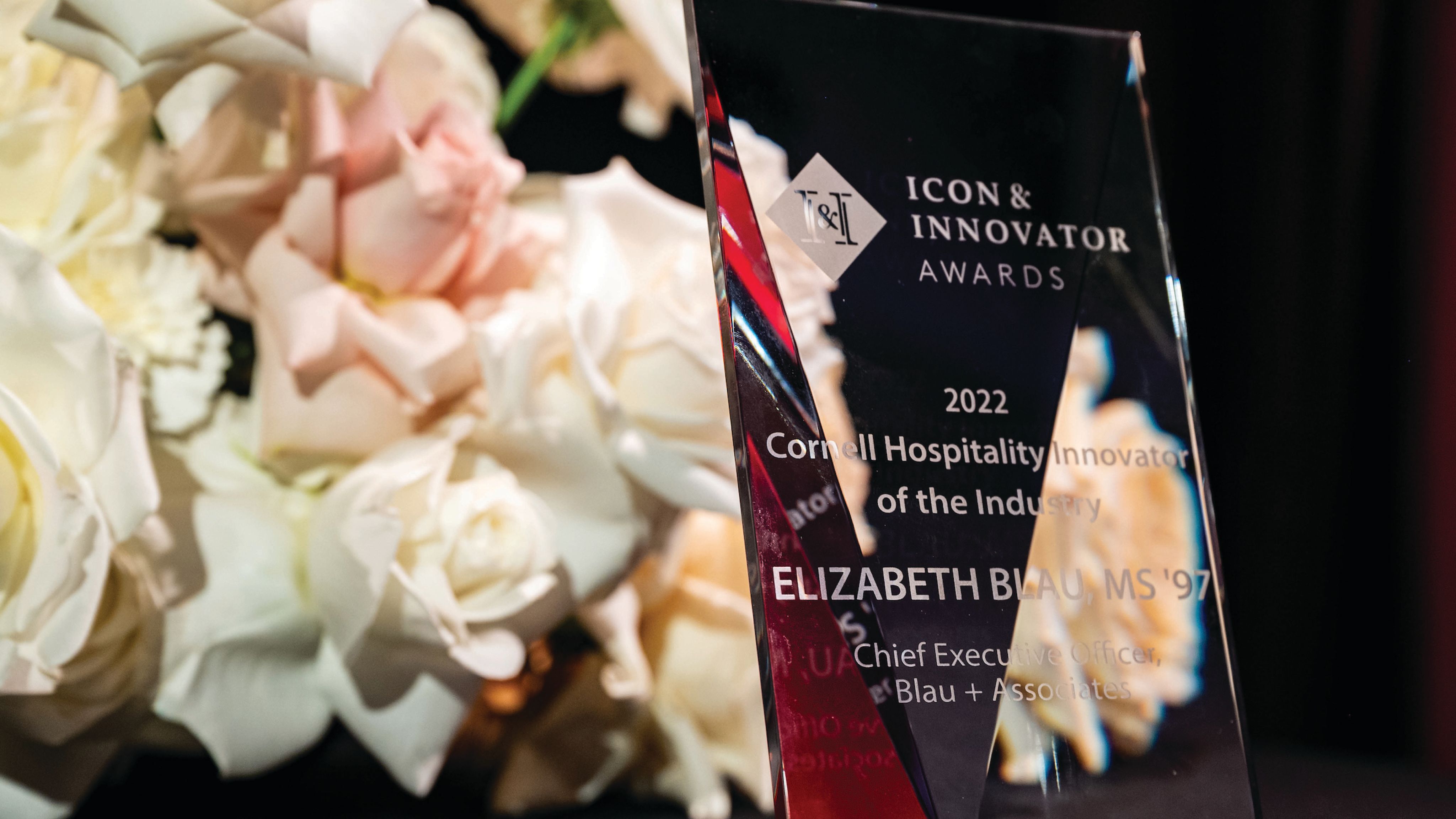 Glass award engraved with Elizabeth Blau, MS ’97.