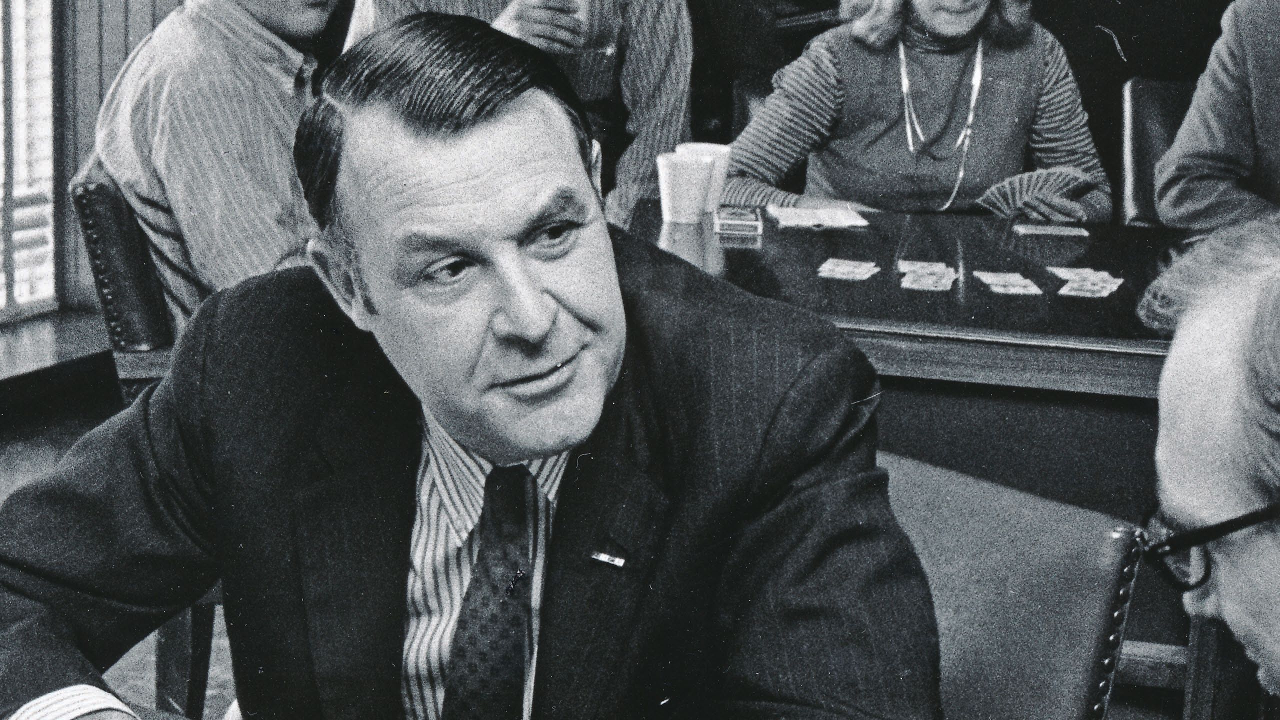 Dean Beck wearing a suit.