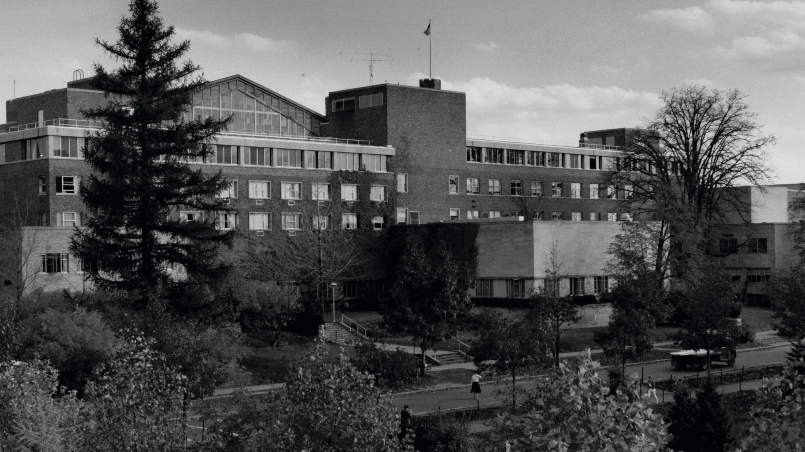 Black and white image of the Statler Inn and School from the northwest in 1982.